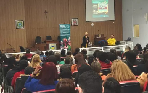 Auditório repleto de pessoas em palestra da Preservalle